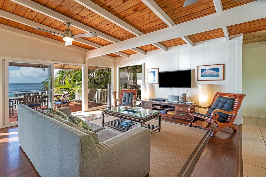 Open living room with access to terrace
