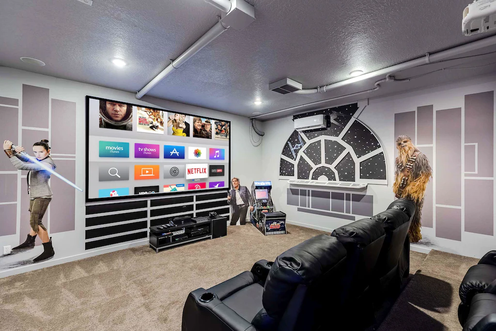 Enter the galaxy theater and games area, which has theatrical seating for 7 people.