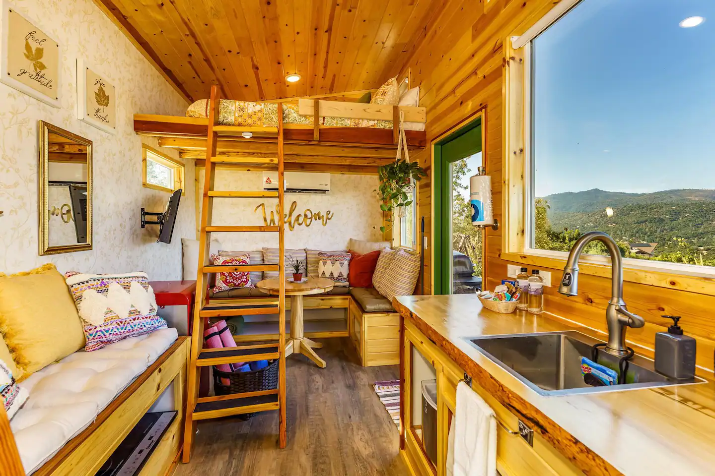 View from the bathroom facing the living room and Queen bed loft!