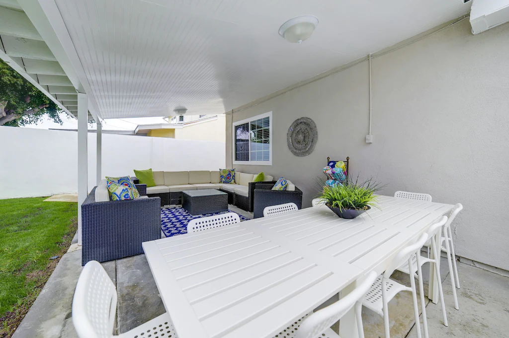 The outdoor dining table seats ten people and is located immediately off the great room.