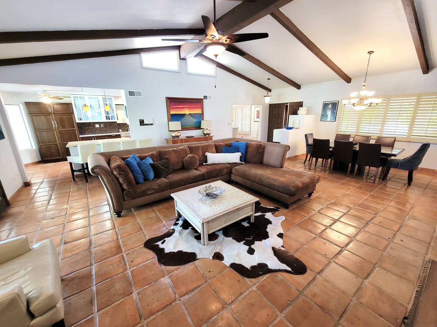 The great room offers ample seating for accommodating large groups and has a satellite Dish TV.