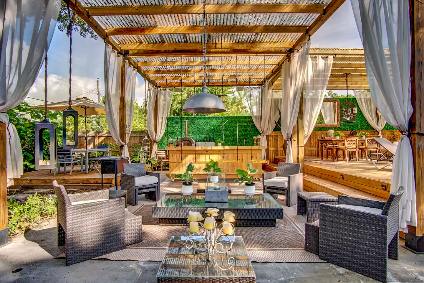 Enjoy the amazing stainless steel outdoor kitchen, gorgeous outdoor dining room plus plush and comfy outdoor living room.