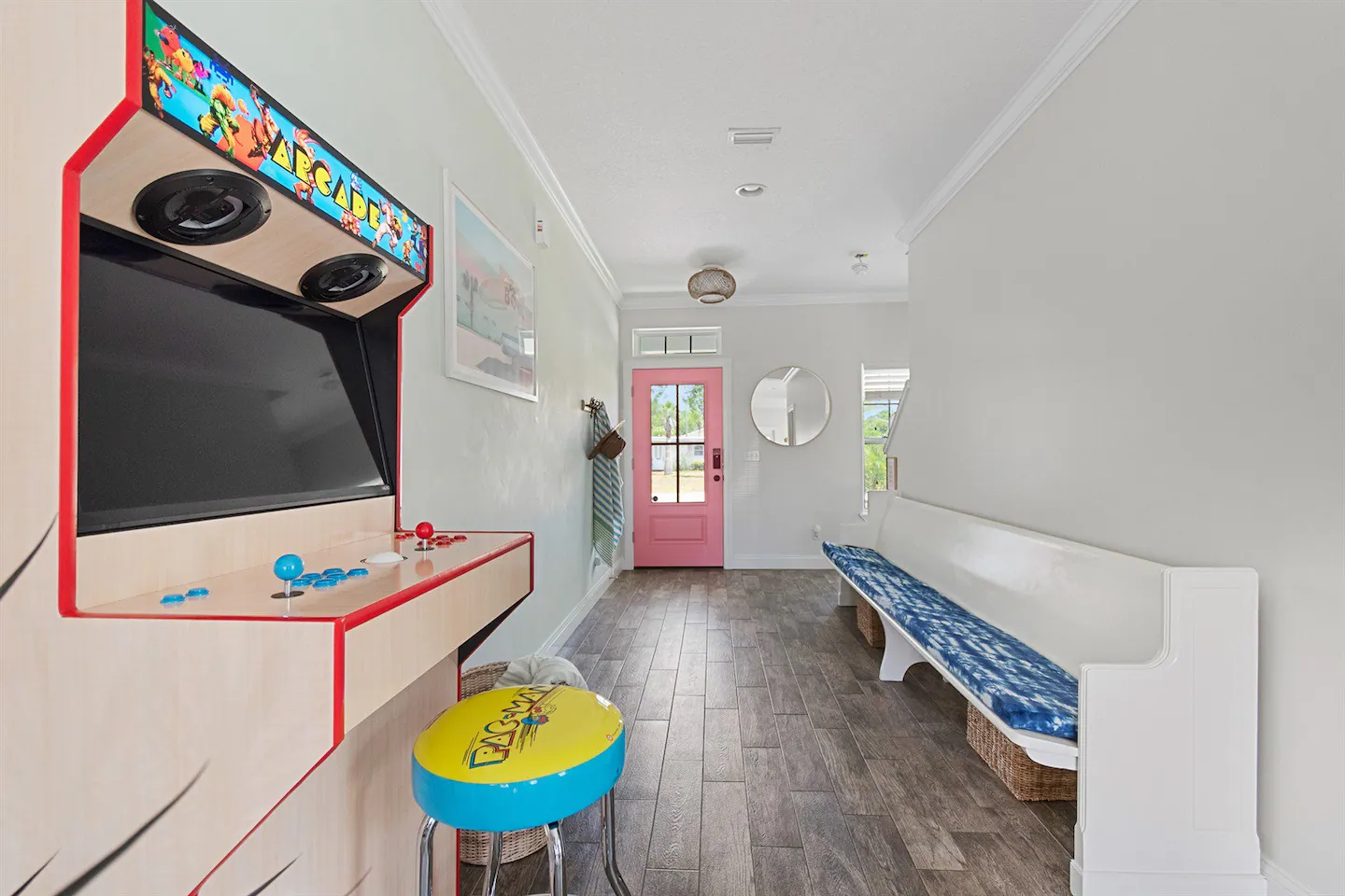 Entrance way with retro arcade featuring Pac-Man
